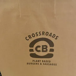 a paper bag with a logo on it