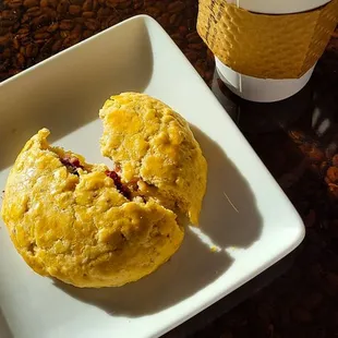 Raspberry filled almond scone