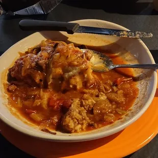 Kind of a mushy cabbage roll (2) and mashed potatoes in a borscht sauce. Meh.