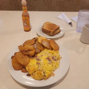 German omelet with American fries and wheat toast