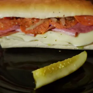 Doctored up with hot giardiniera, mayo, extra tomato and oregano, now it's really good on that fresh bread