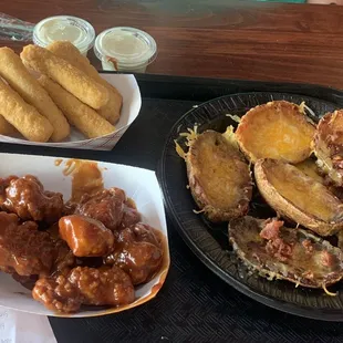 Boneless honey barbecue wings, potato skins, and mozzarella sticks