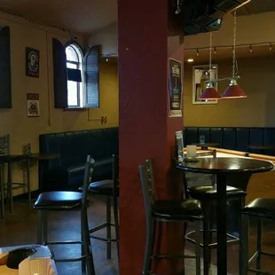 a pool table and chairs