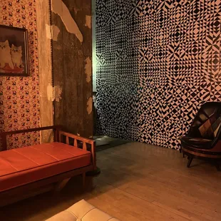 a room with a couch and a chair