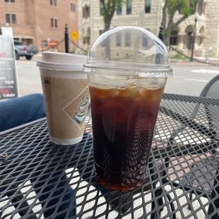 a cold beverage in a plastic cup