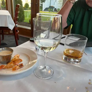 What's left of the Caesar dressing, jumbo shrimp, the fantastic Chardonnay and a glass of Western Reserve organic wheat whiskey.