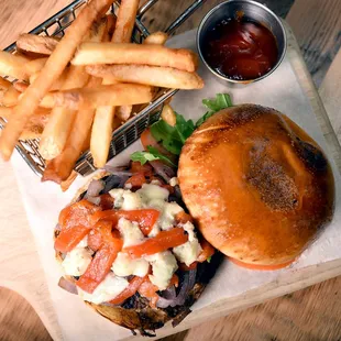 Crosta Burger with gorgonzola, caramelized onion, tomatoes, sweet-hot pickles and truffle fries