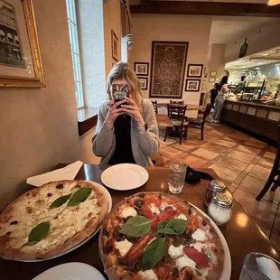 a woman taking a picture