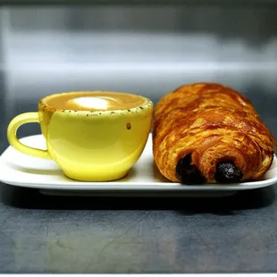 Macchiato and chocolate croissant