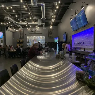 Love how the lights reflecting off the bar top created an odd image.