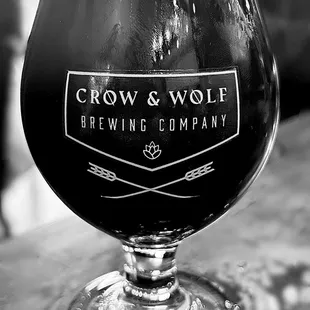 a glass of beer on a table