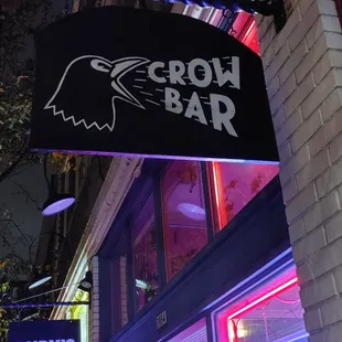 a neon sign for crow bar