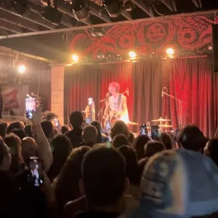 Jack Kays. 11/12. Standing in back by bar.