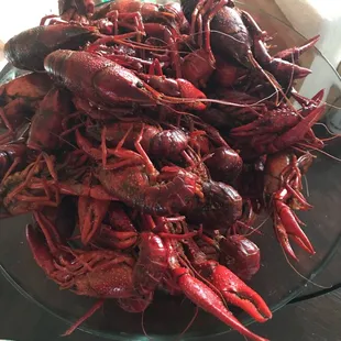 a plate of craws on a table