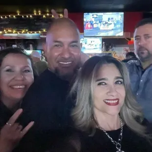 a group of people posing for a picture