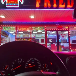 a neon sign in the background