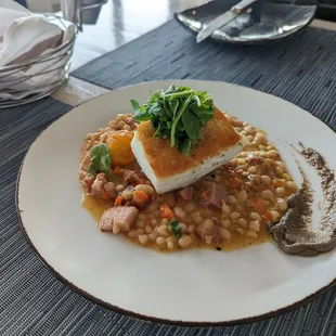 Halibut with white truffle sauce on the side (Catch of the day)