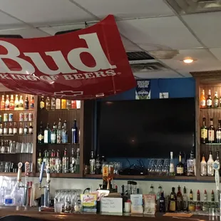 Our bar with many different beers and alcohol.