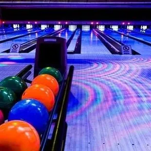 bowling lanes with bowling balls