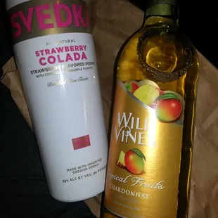 a bottle of wine and a bottle of vodka