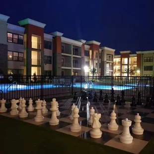 Nighttime courtyard view of Crown Lone Oak.