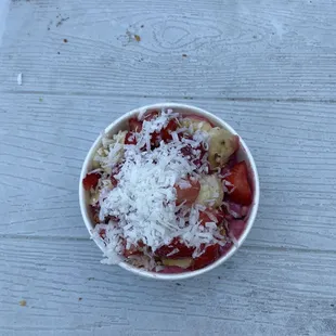 a bowl of strawberries and bananas