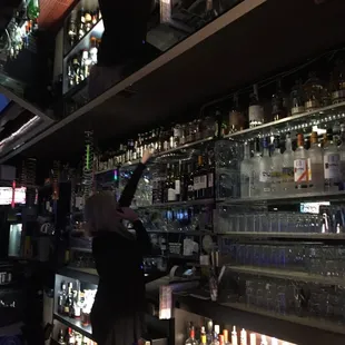 a bartender at the bar