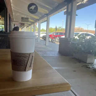 Coffee cup and sign for coffee shop