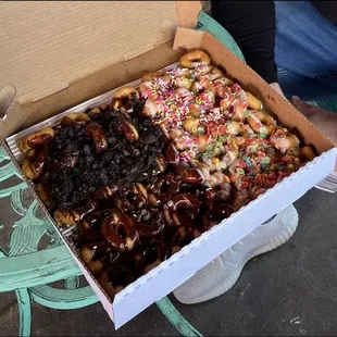 Box of Mini donuts!  Oreo, Chocolate, sprinkles, fruity pebbles.....yes!