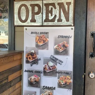 open sign in front of store