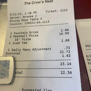 a receipt and a cell phone