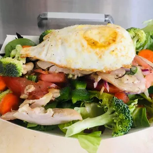 Chicken garden salad add a fried egg.
