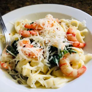Special wild Chilean shrimp sautéed in garlic butter with spinach and pasta.
