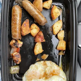 Two 2 Eggs , Any Style with hash and sausage