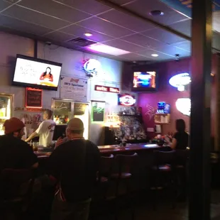 people sitting at the bar