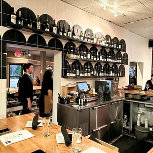 a group of people at a bar