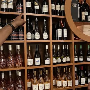 a man pouring wine into a glass
