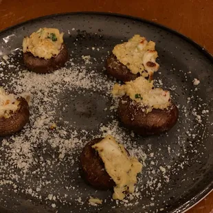 a plate of stuffed mushrooms