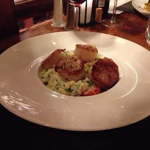 Sea scallops with candy corn risotto.