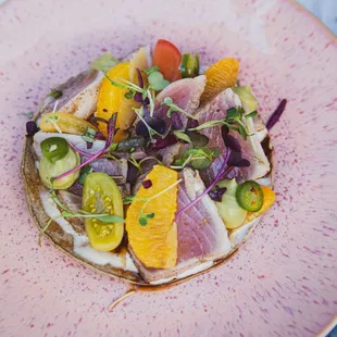 Our Citrus Yellowtail tostada is a foodie favorite.