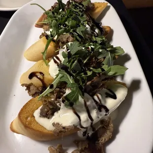 Shaved Ribeye Crostini