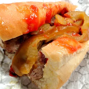 Grilled Italian sausage with peppers and onions