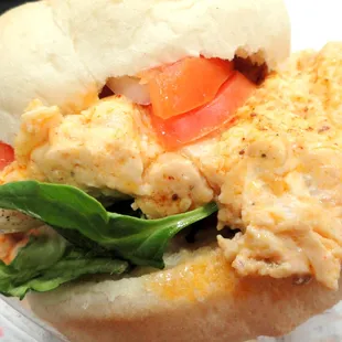 Chicken Chesapeake Cruisin' Style (lump crab dip on grilled chicken breast, cheddar cheese, mixed greens and tomato)