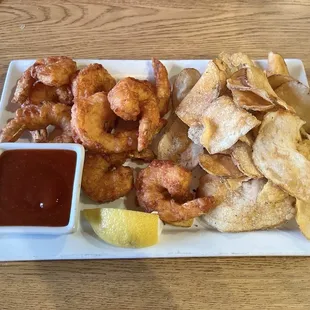 Beer battered shrimp with fresh potato ships. Very satisfying...