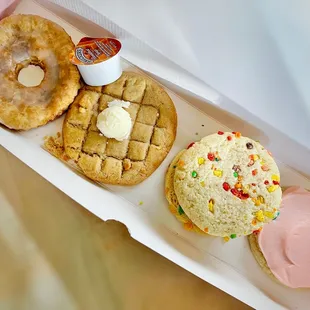 Old fashioned doughnut, waffle, fruity pebbles with cereal milk mousse, classic sugar cookie with almond frosting