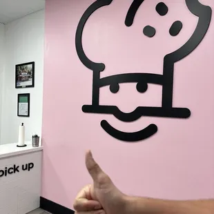 a person giving a thumbs up