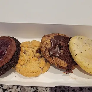 Chocolate raspberry, chocolate chip, chocolate crumbl(?), lemon poppy