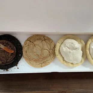 Took advantage of free delivery Left to Right: dirt cake, ultimate peanut butter and 2 banancream pie