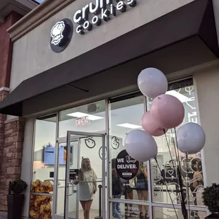 Outside, next to Starbucks