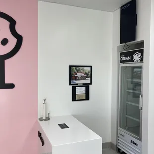 a pink and white kitchen